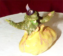 clay dragon breaking out of egg
