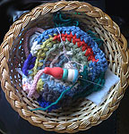 basket of knitted rope rug